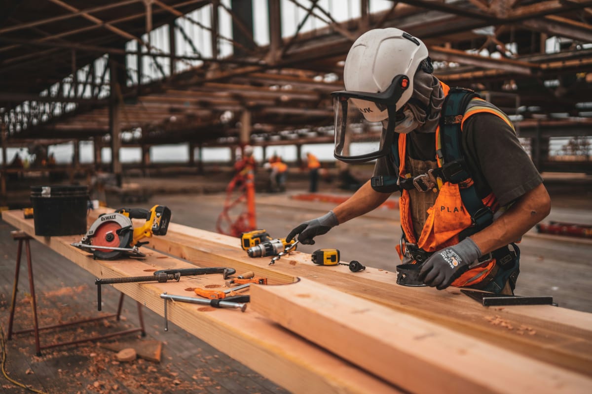 Self-employed contractor reviewing health insurance plan options