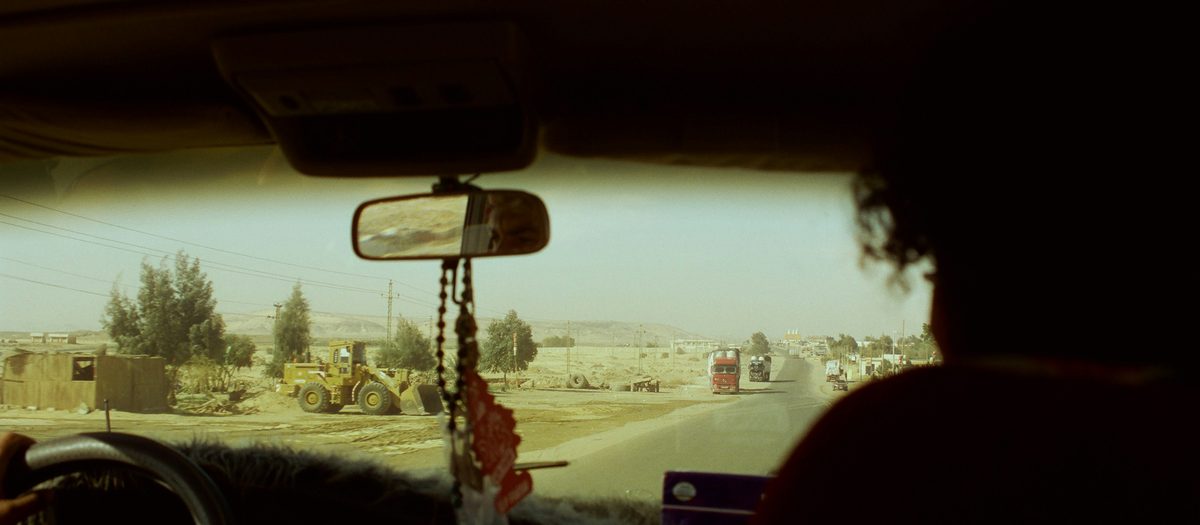 Highway view from a truck cab at a state line